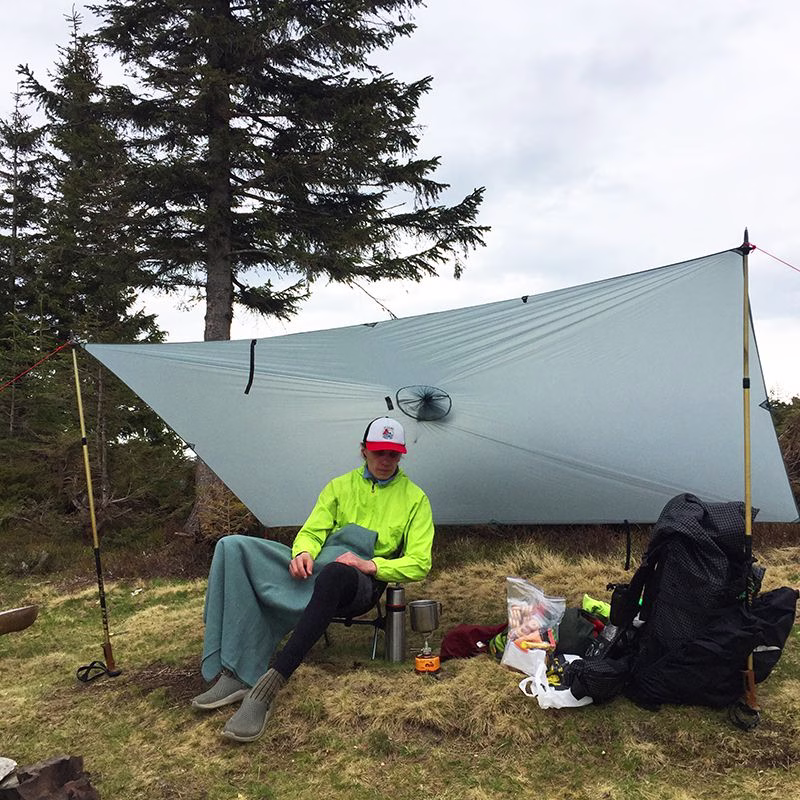 ROCK FRONT Rain Ghost ultralight poncho tarp in a camp
